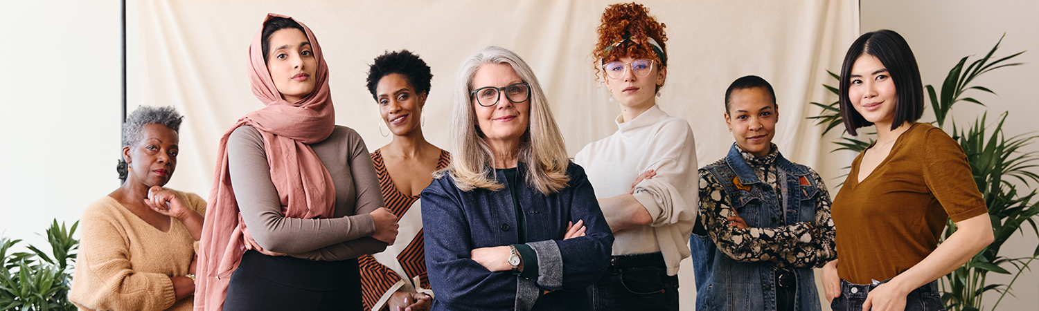 Women business entrepreneurs of diverse backgrounds standing together 